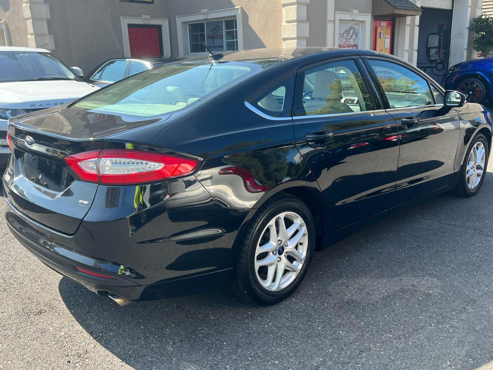 2016 BLACK /Beige Ford Fusion (3FA6P0H78GR) , located at 1018 Brunswick Ave, Trenton, NJ, 08638, (609) 989-0900, 40.240086, -74.748085 - Just Arrived! 2016 Ford Fusion | Loaded up | Just Serviced | $8,995 | Call Now! This Vehicle will not last long!!! Pinto Auto Group PintoAutoGroup.com 609-989-0900 - Photo #2